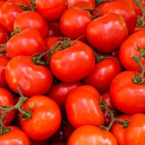 A vivid collection of fresh, ripe red tomatoes perfect for nutritious meals.